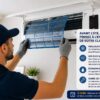Nettoyage des filtres d’une clim murale dans un intérieur lumineux.